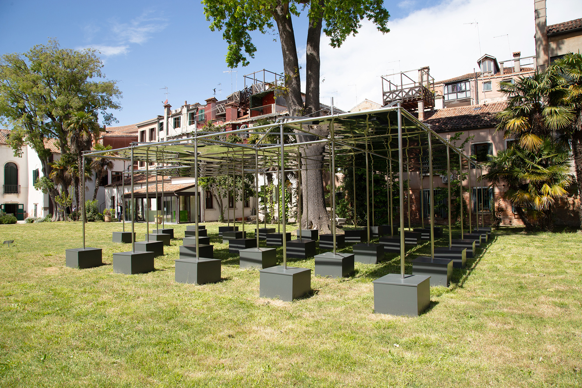 OUR LABOUR, Transparent Pavilion, 2024, Stainless Steel
              11.5×11.5×3.5 m. Provided by Bf. Photograph by Hyunjung Kwon.